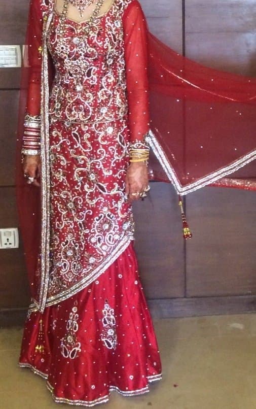 Red bridal lehenga — image 1