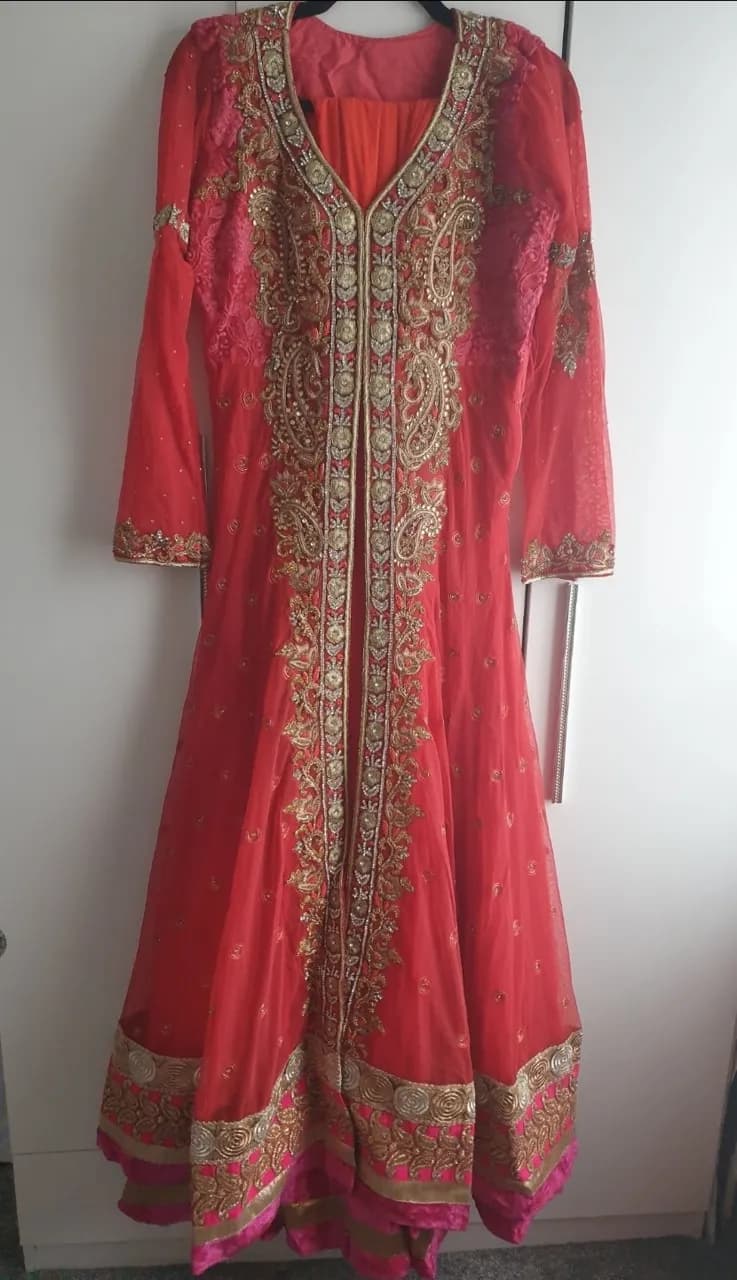 Heavy orange net dress with dupatta and trouser — image 1