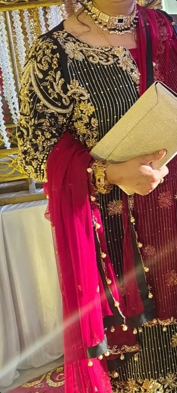 Stunning black and gold wedding wear outfit — image 1