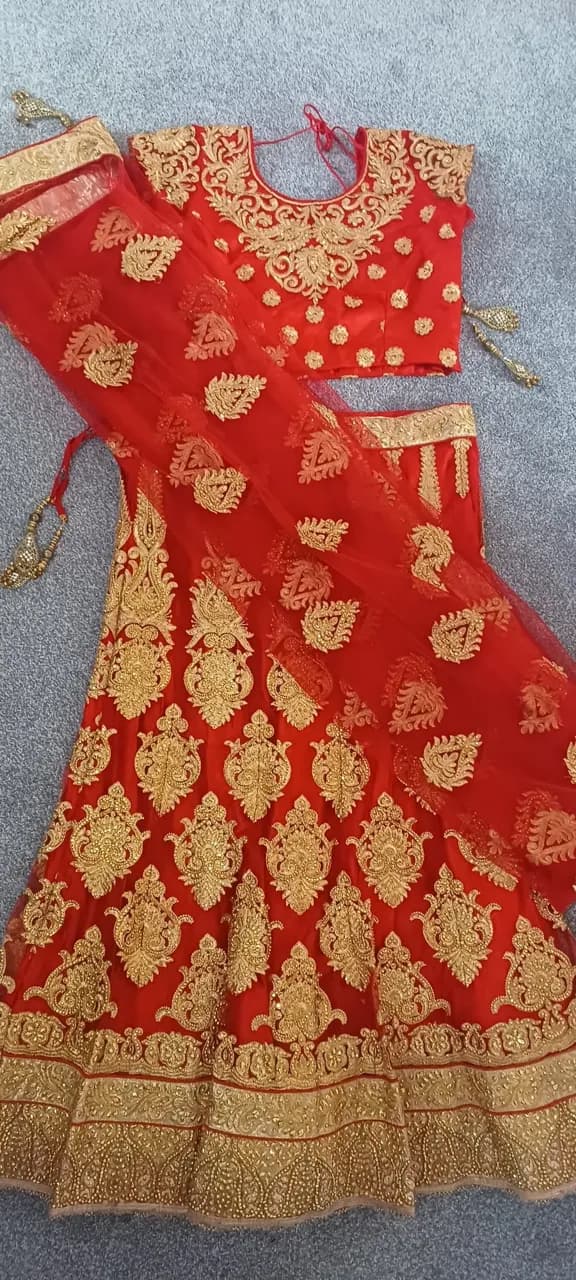 Red Lehenga wedding — image 1